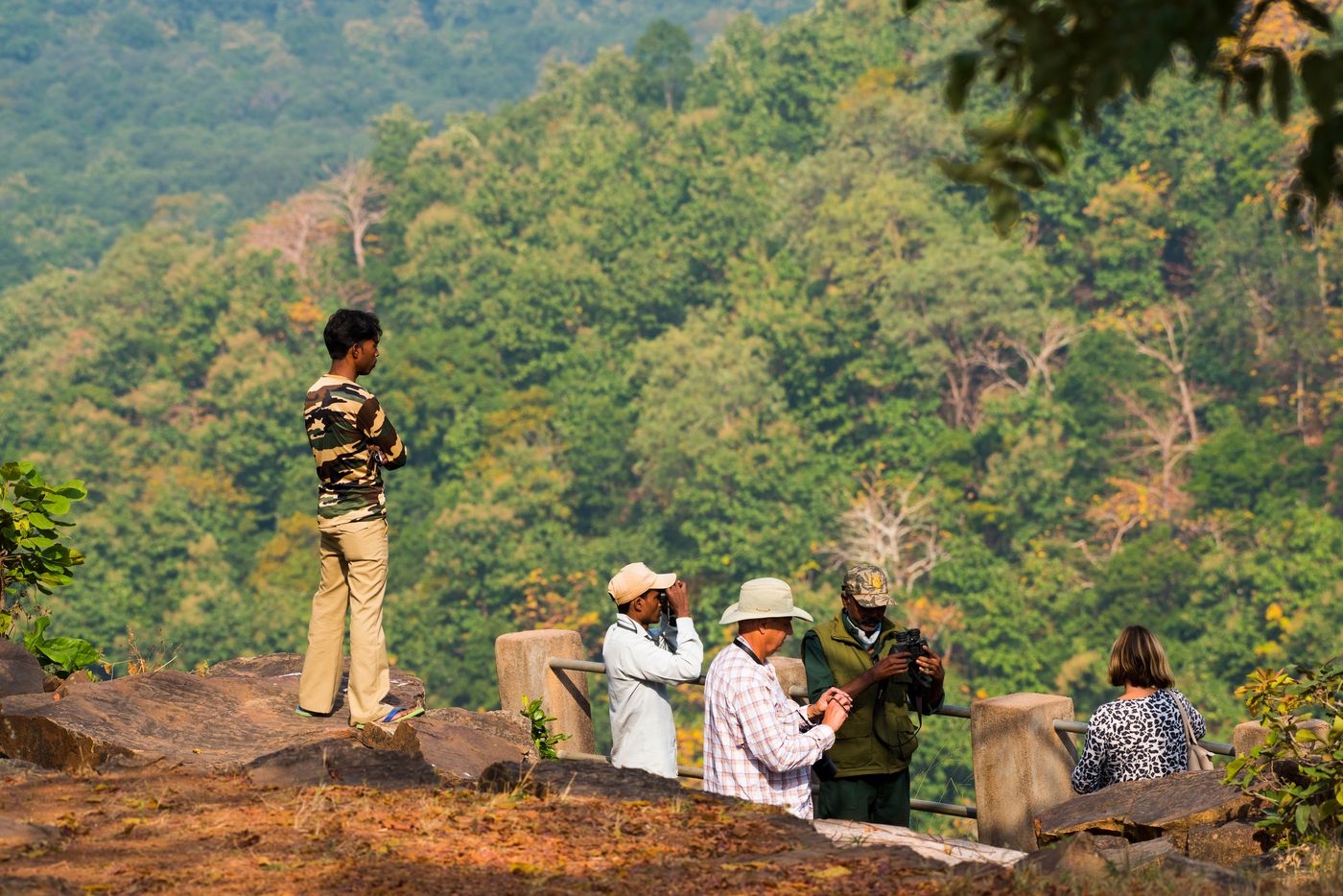 Tourists receive assistance from their wildlife tour guide in the Panna Reserve