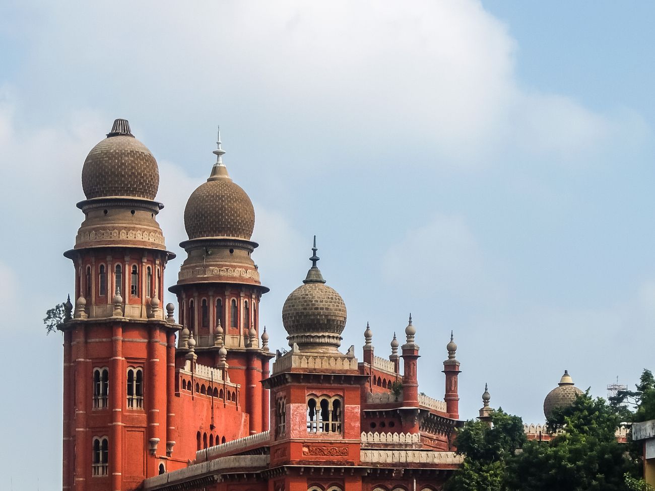 A beautiful skyward view of Madras Law College’s red brick towers