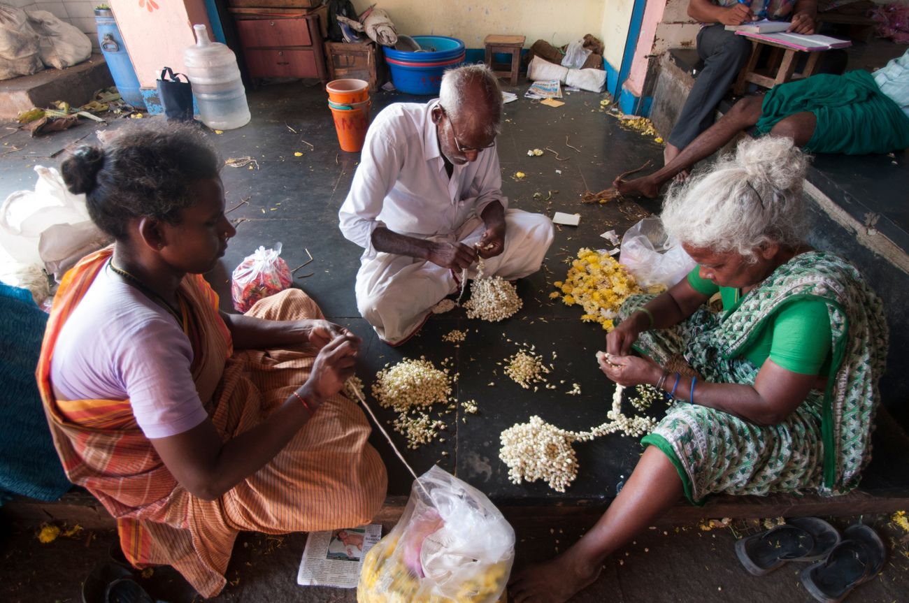 A family of vendors prepare their vegetables for sell at the Farmers’ Market in Chennai