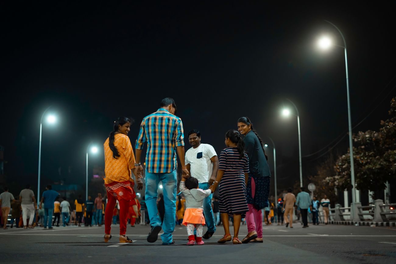 A happy family strolling down Marina Beach promenade on New Year’s Eve