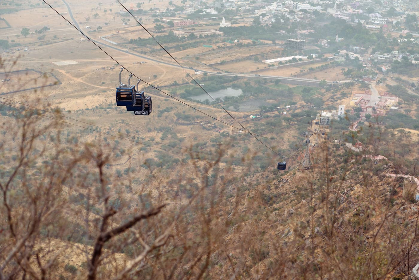 A ride in the cable car to the Savitri Mata Temple high up on the hill affords sweeping views of the valley and lake surrounded by the town of Pushkar 