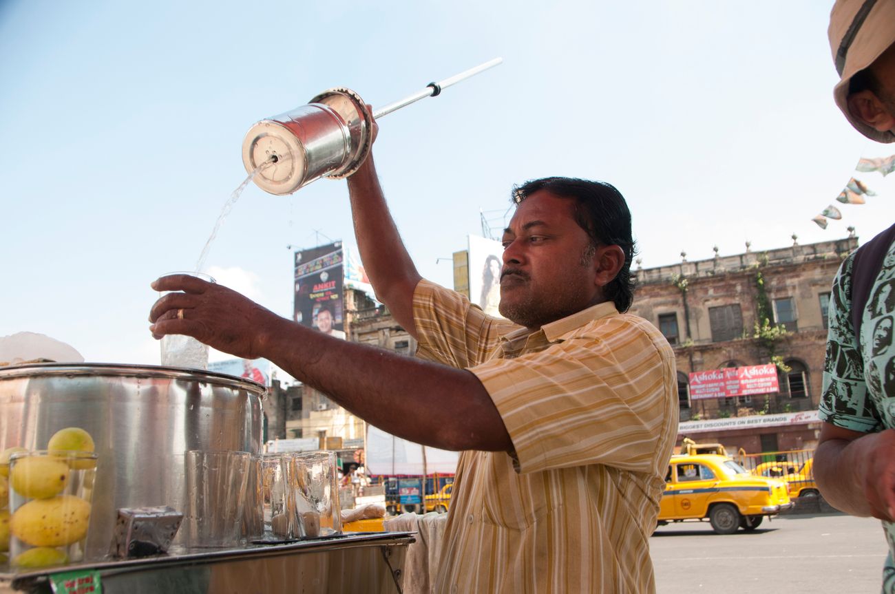 A street vendor selling Indian style lemonade on the streets of Kolkata 