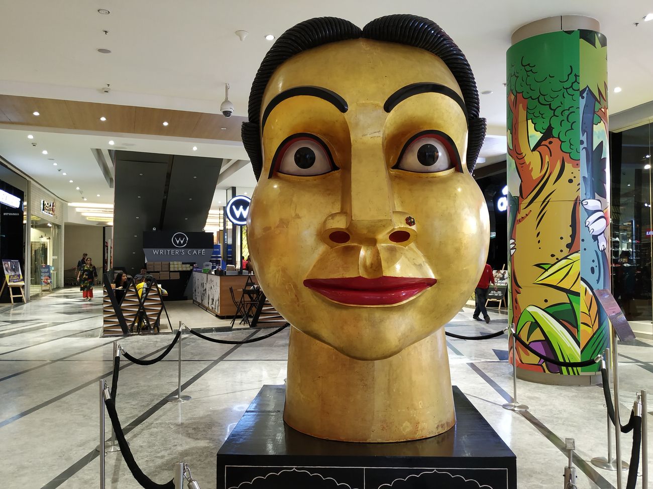 A striking head sculpture and decorative pillar form part of the nine art installations inside Phoenix Market City