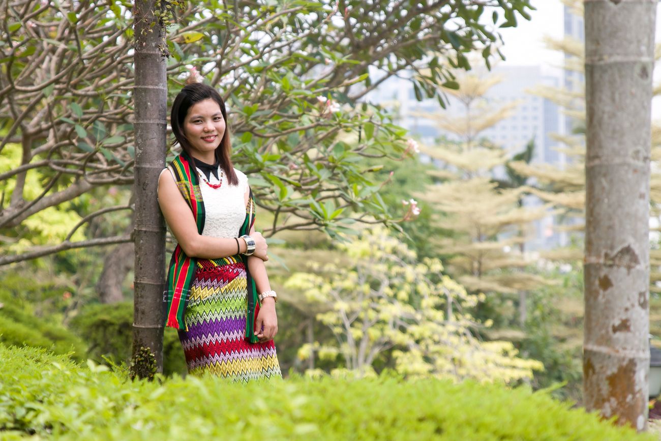 A young woman from the Zomi tribe of Mizoram dressed in the traditional garb of the community
