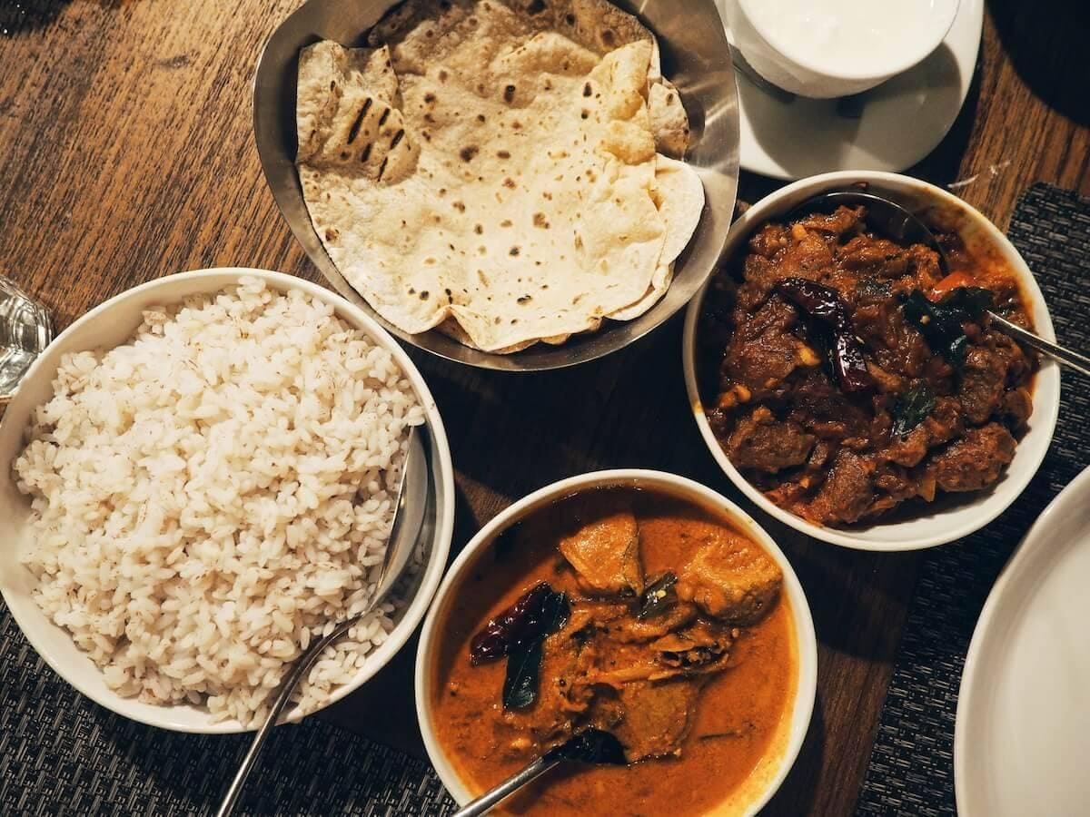 Alleppey Fish Curry, with coconut and fresh mango is the local favorite.