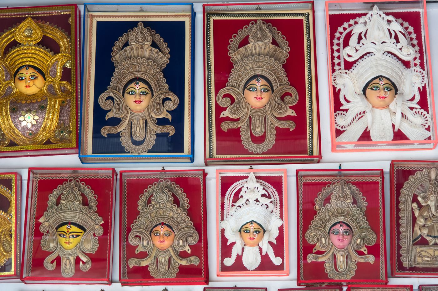 Beautifully decorated idols of the Hindu deity Durga on sale in a Kolkata shop