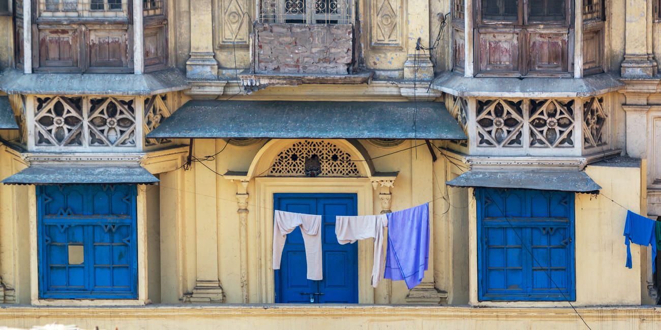 Characteristic blue doors and shutters of traditional houses in Old Delhi