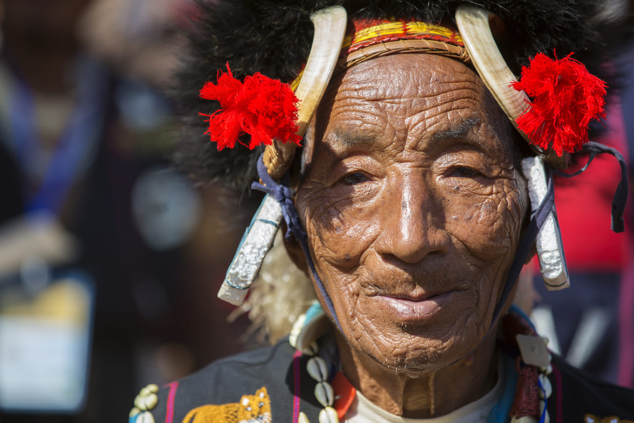 Characterful portrait of an elderly man from Nagaland. People consider the festival sacred, so participation is important