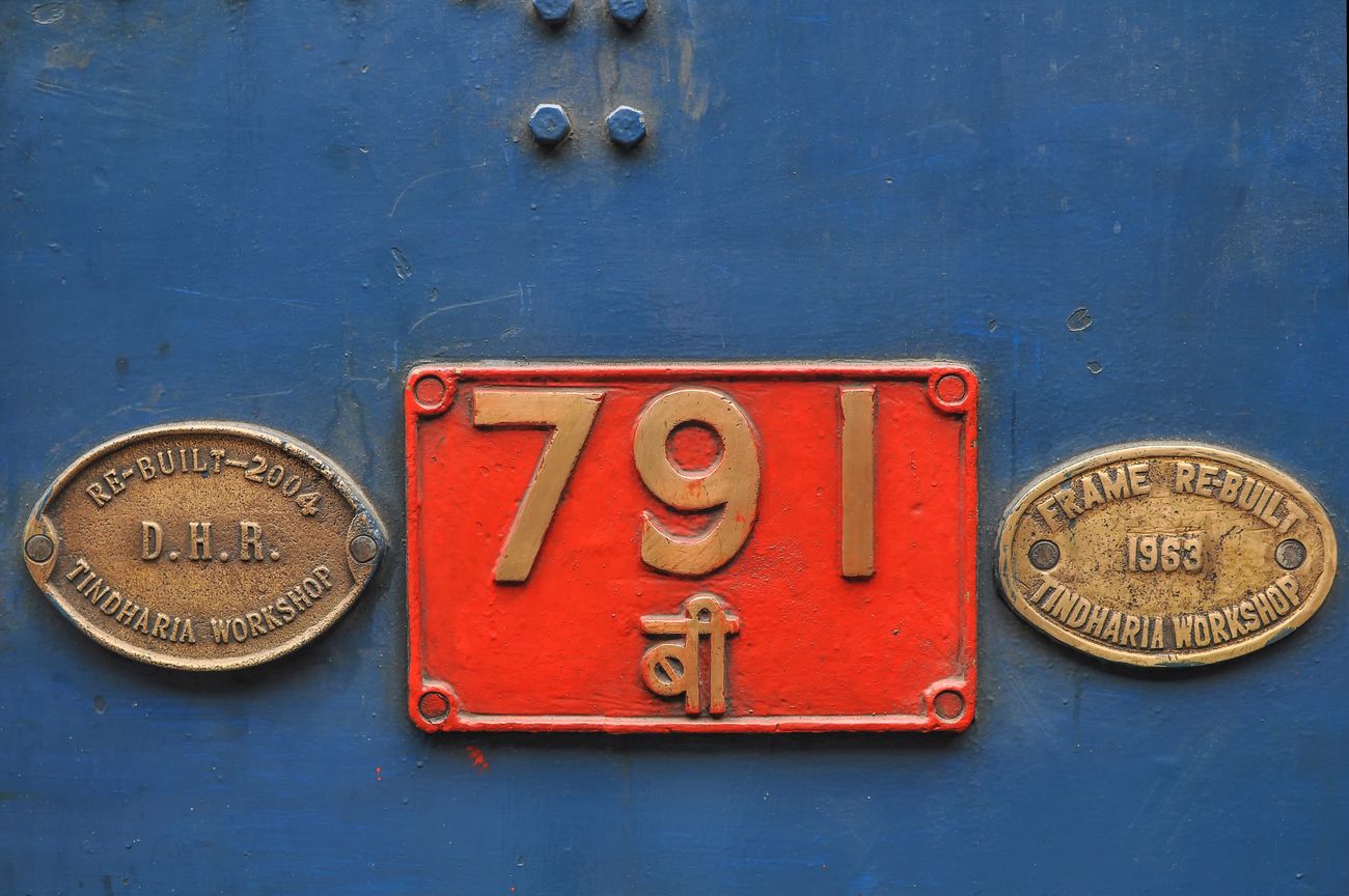 A close up shot of the number plate of the Darjeeling Himalayan Railway Toy Train, which has been a hit amongst locals and travellers since it was first introduced 