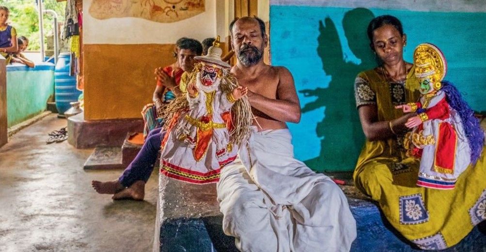 Craftsmen create glove puppets and practice the art of puppeteering, generally depicting characters and scenes from tales of God