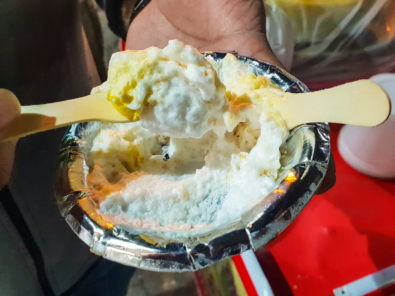 Daulat ki chaat, a delicious traditional Indian sweet dish in an Old Delhi market 