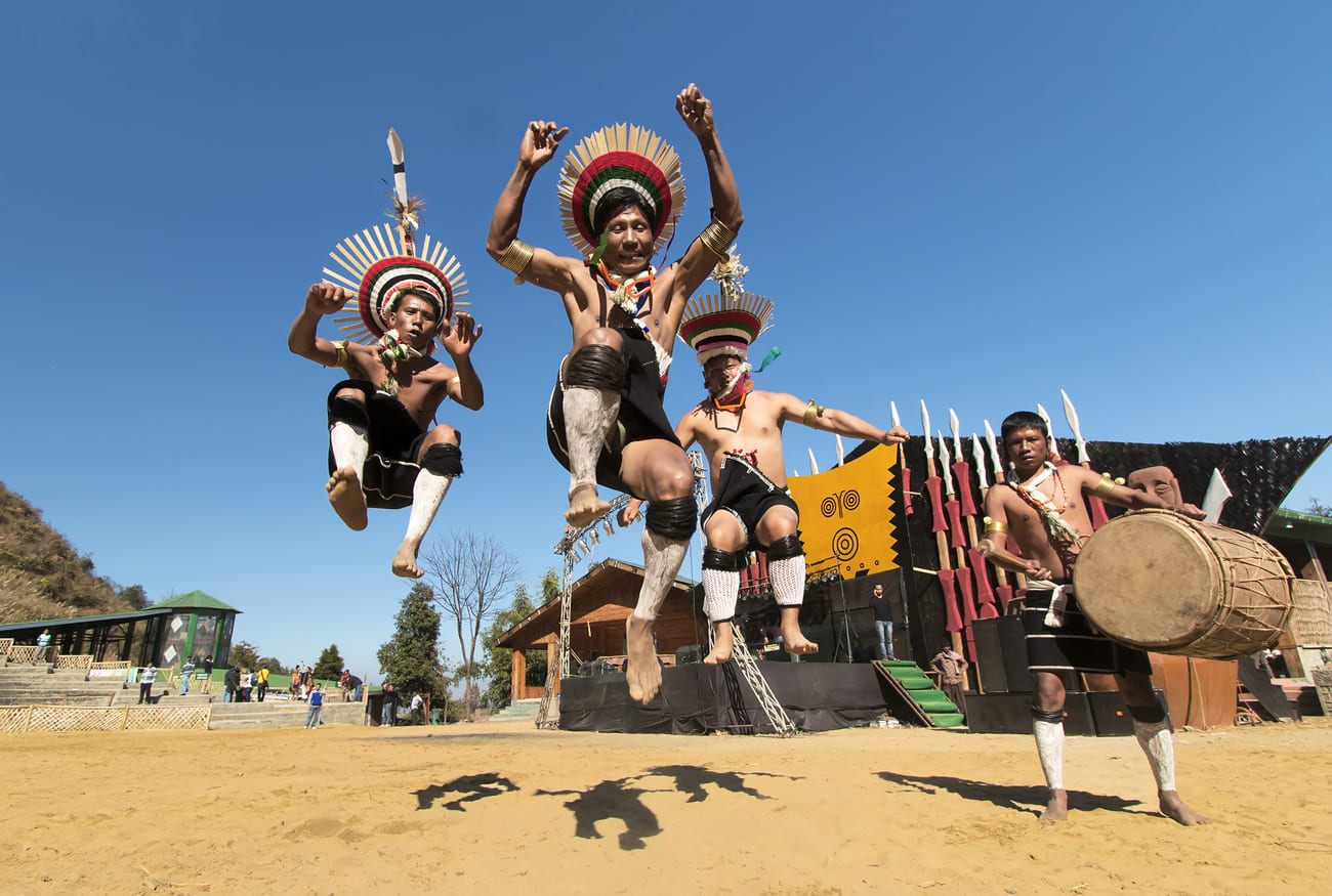 Exuberant dance movements by Zeliang Naga tribesmen to impress the audience and demonstrate their skill 