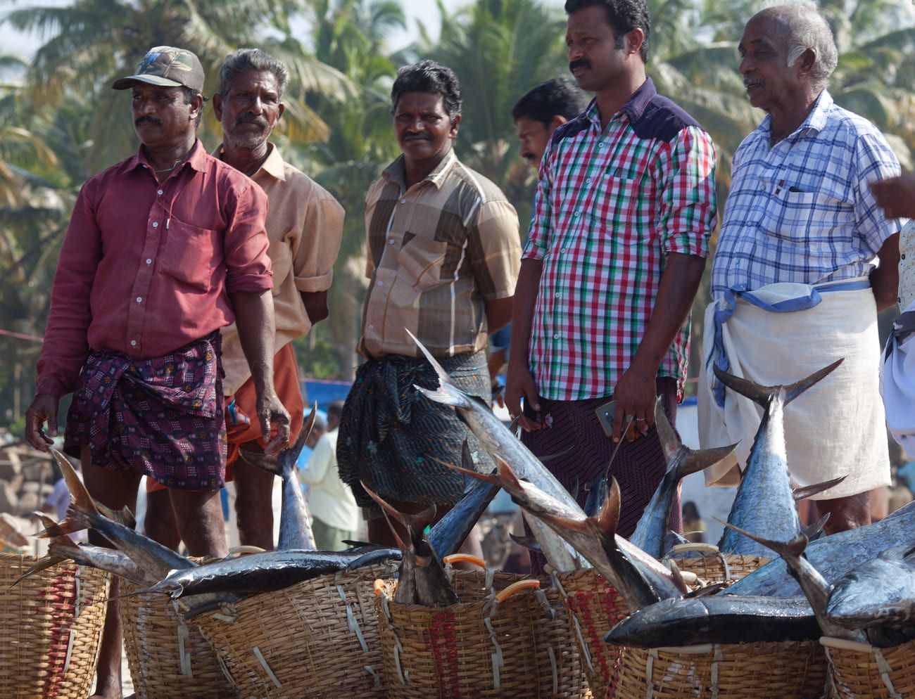 Fishermen awaiting their customers at the marketin Mararikulam