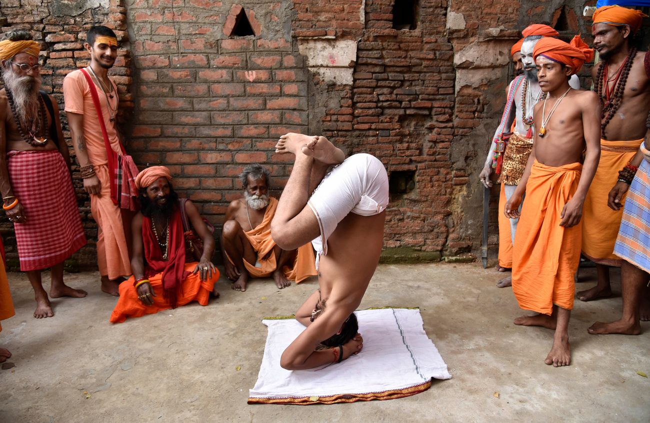 Hindu saints and yogis at the Kamakhya Temple in the city of Guwahati, Assam perform expert poses with ease on International Yoga Day. Iyengar yoga is named after one of the most famous yogis to come out of India, B.K.S. Lyengar 