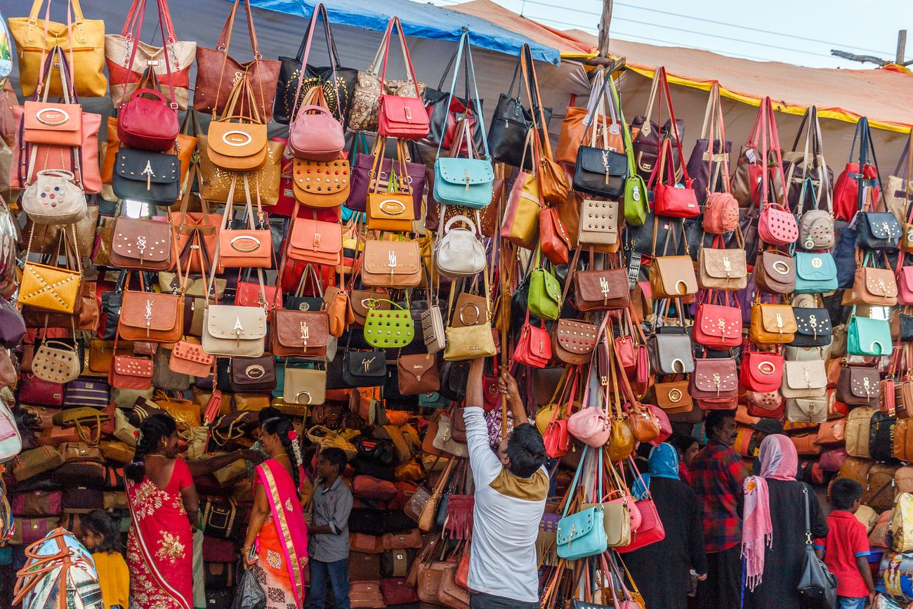 Hundreds of colorful leather handbags to choose from at a street store