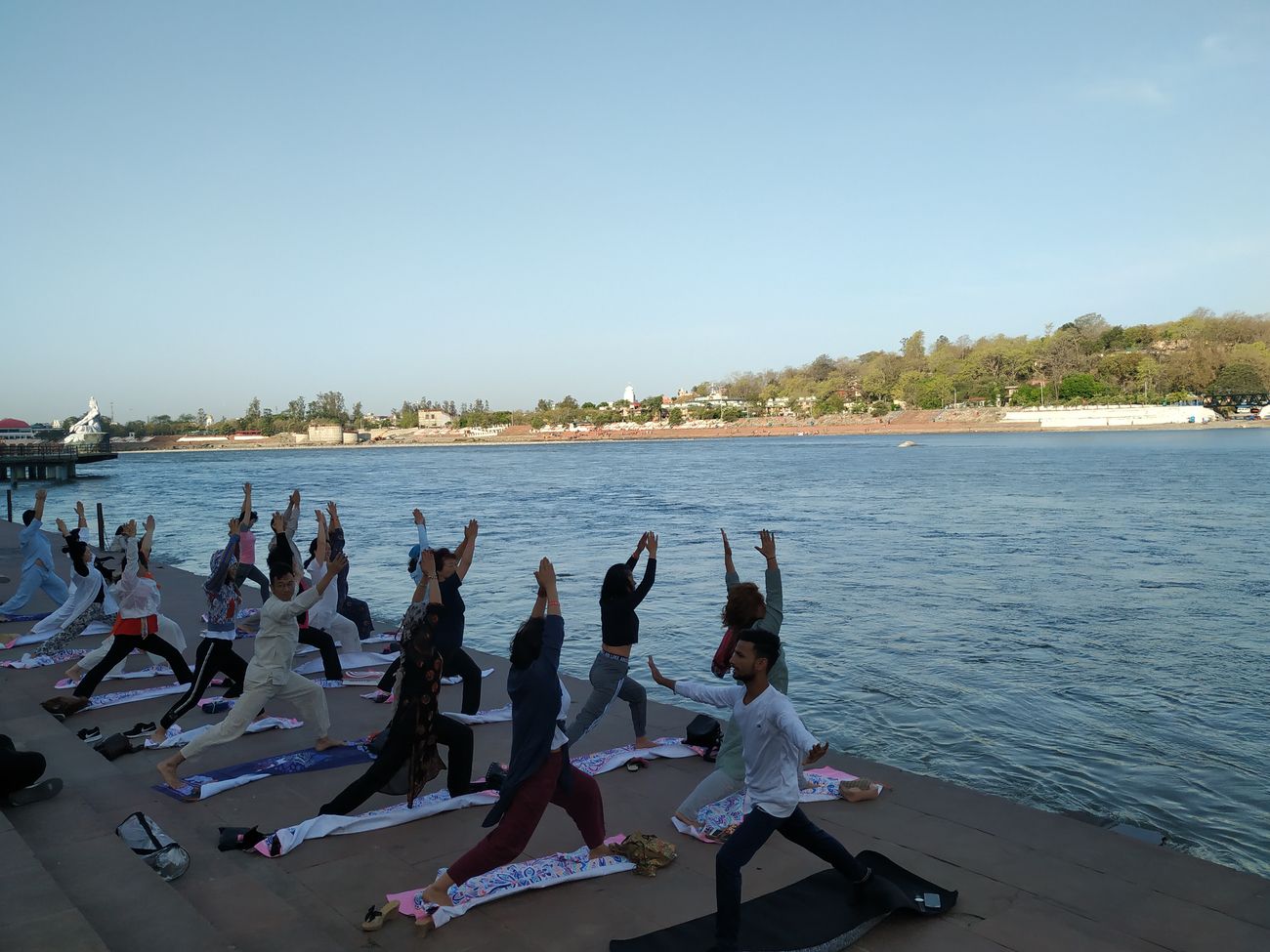 Indian and international yoga enthusiasts practice yoga at the banks of the holy river Ganges at Rishikesh in Uttarakhand on International Yoga Day.The Maharishi Mahesh Yogi Ashram in Rishikesh shot to fame when the Beatles spent a summer here learning yoga and meditation