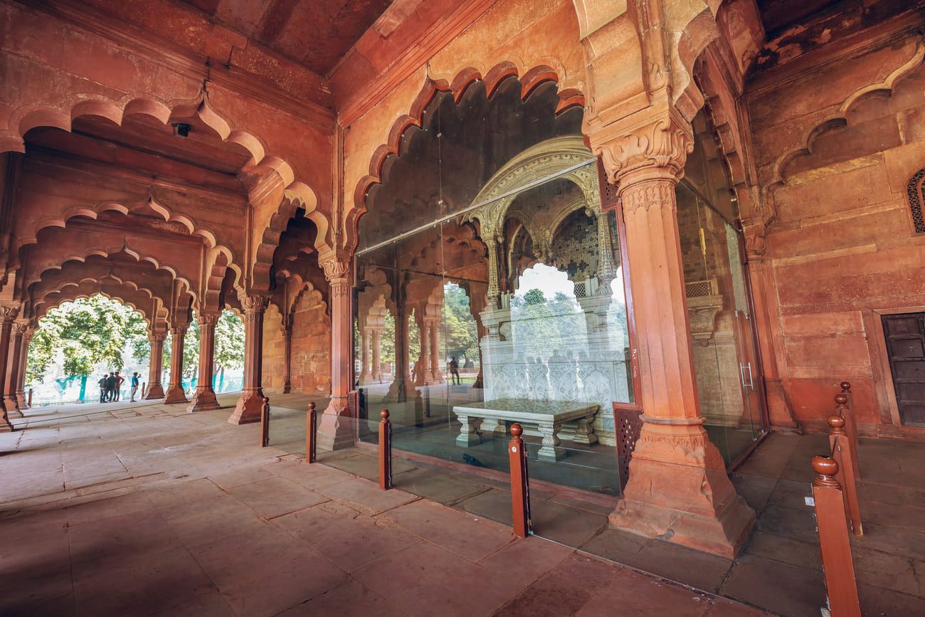 Medieval Mughal throne in glass casing at the Red Fort (Diwan-i-Aam), also known as the Public Audience Hall, in Delhi, India