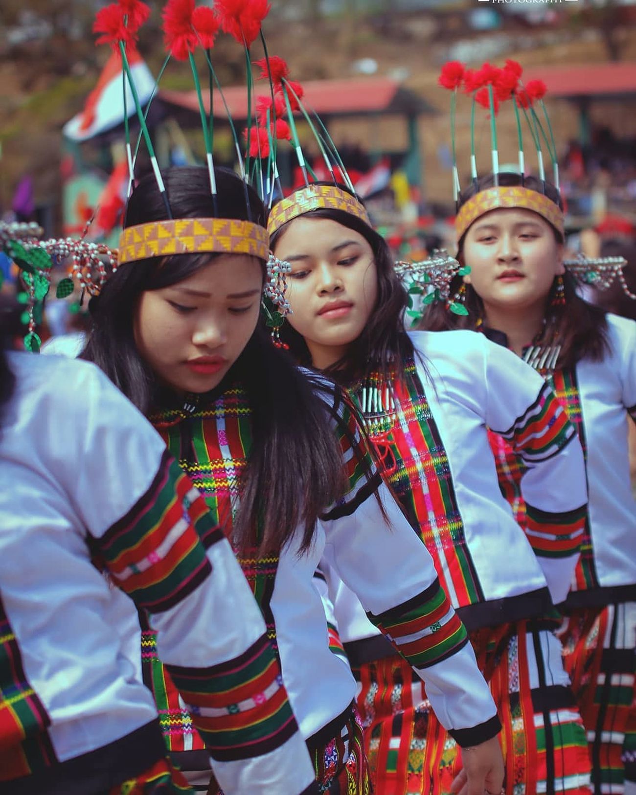 Mizo Girls performing a folk dance in traditional dress of Mizo tribe