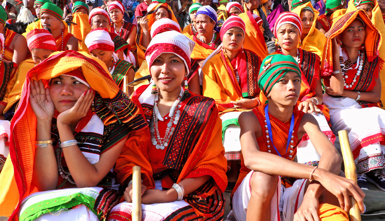 North Indian tribal artists in colorful costume wait to take part in the annual Hornbill Festival in Kohima 