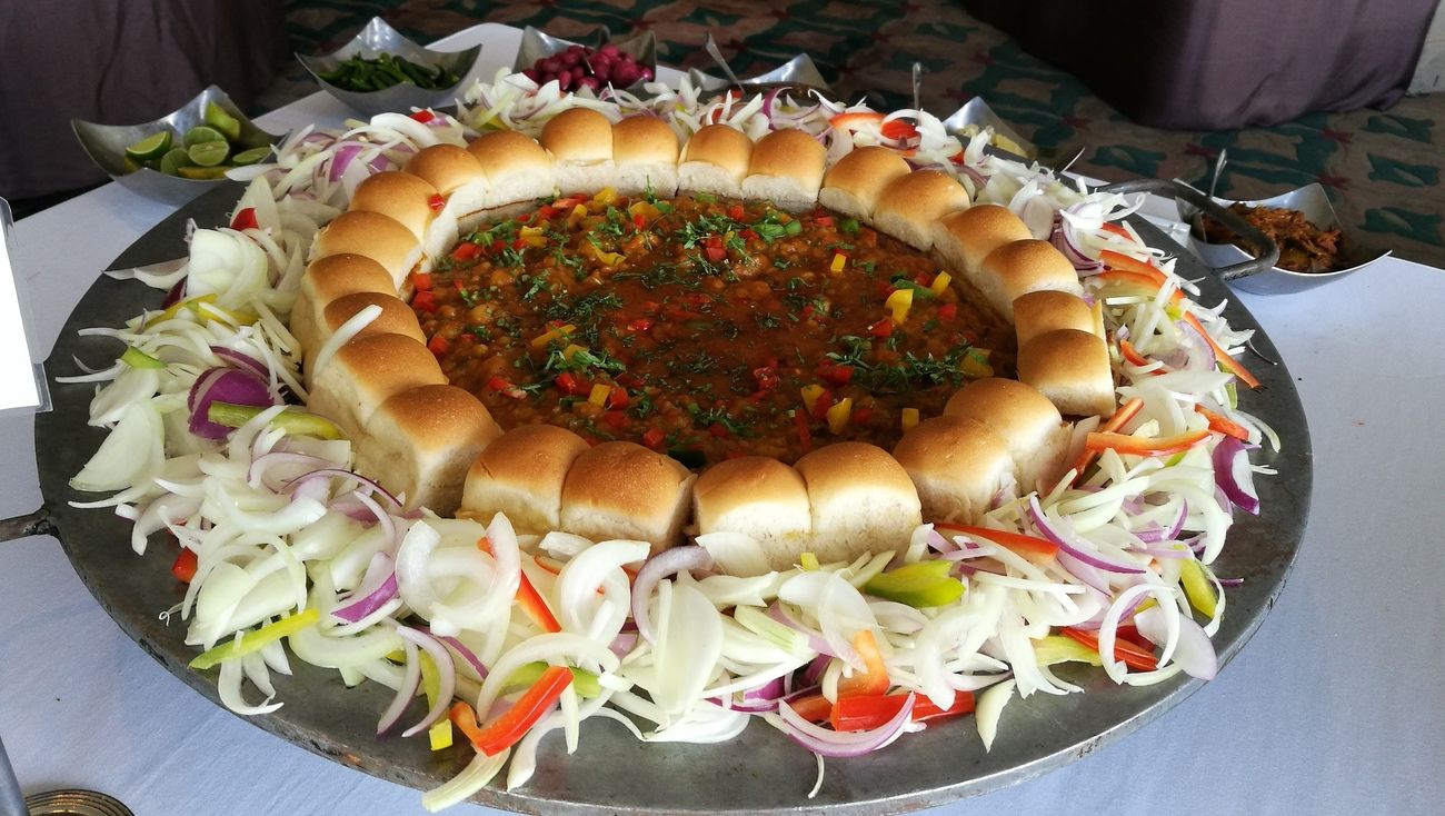 One of its most famous street foods, the pav bhajiwas invented in Mumbai as a speedy lunchtime dish for textile mill workers. This spicy and buttery dish combines a bunch of vegetables with mashed potatoes, then eaten with the soft bread called Pao