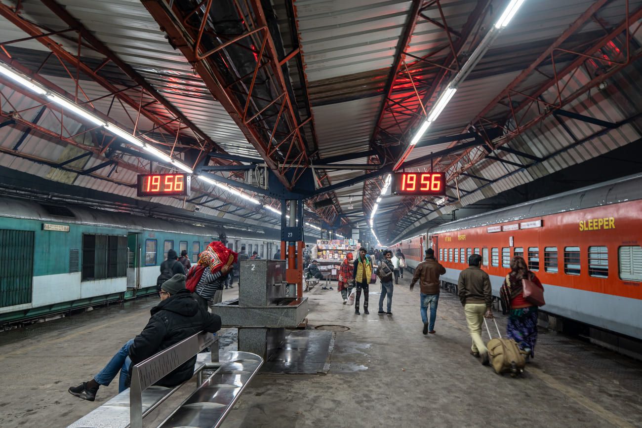 Passengers getting ready to board trains at New Delhi station 