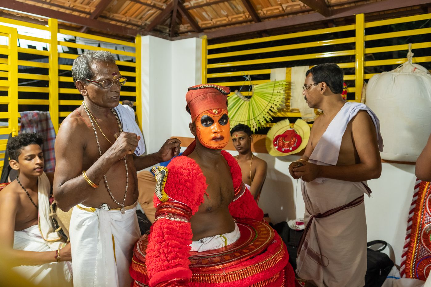 Religious performance by the Theyyam artist perform during the temple festival in the town of Payyanur in Kerala. Theyyam is a popular ritual form of worship in Kerala 