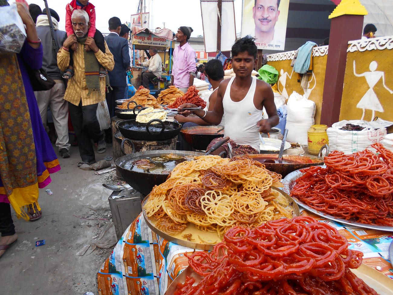 Street stall selling sweet jalebis to visitors at the fair in Sonepur. This sweet is popular all over South Asia and the Middle East