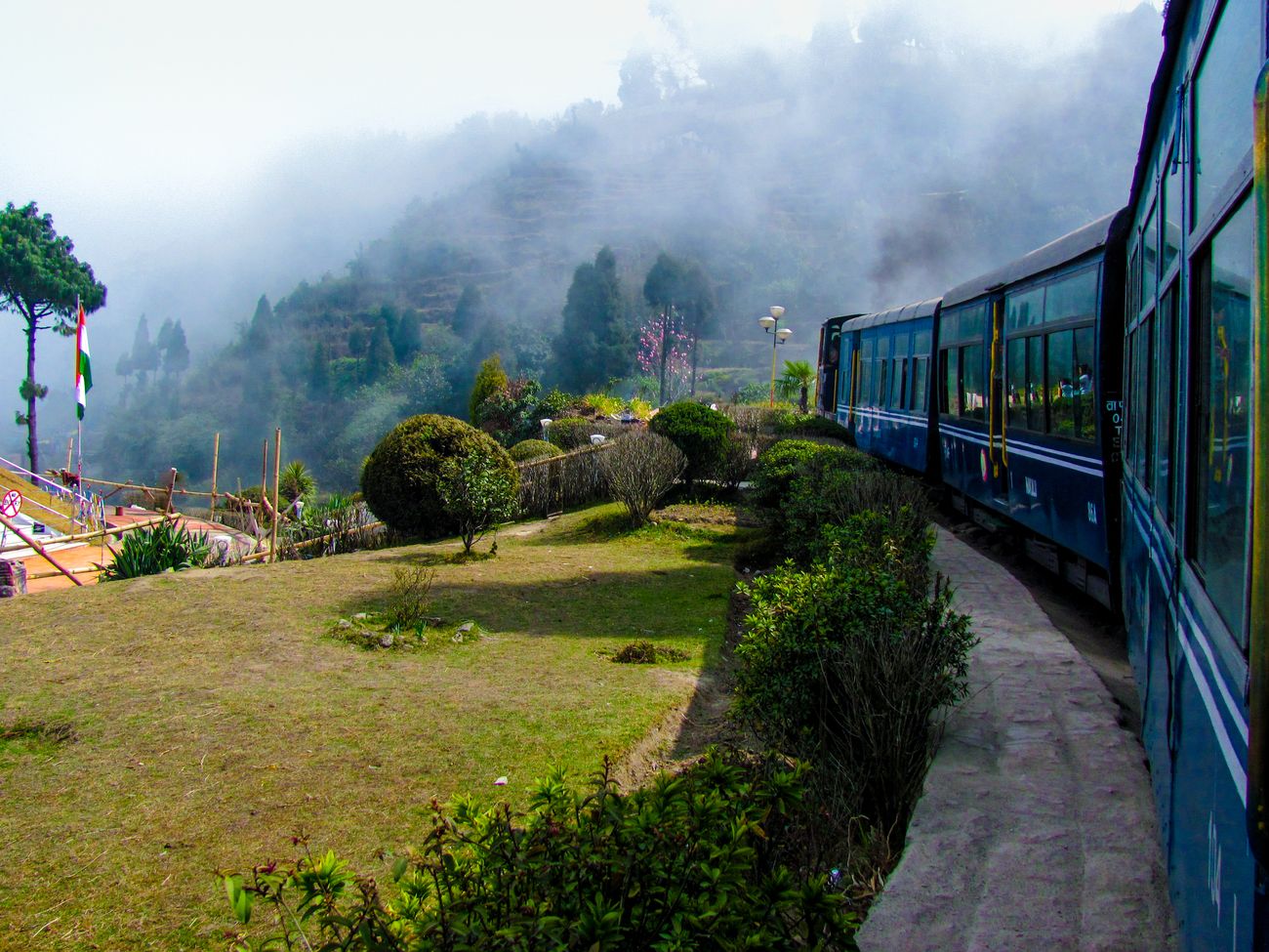 The Darjeeling Toy Train is known for excellent views of gardens and valleys through its course across the picturesque landscape of Darjeeling