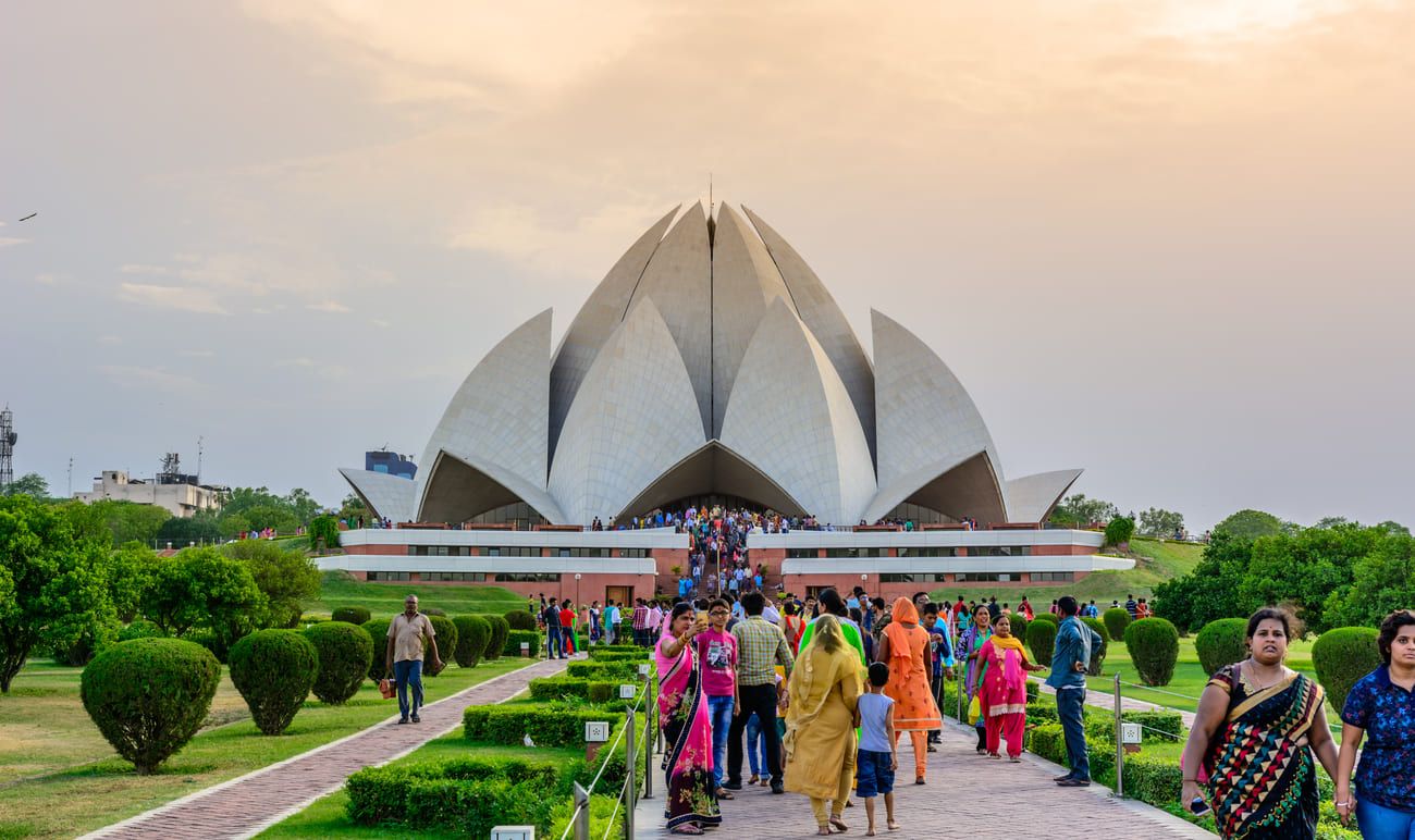The Lotus Temple, so named because of its lotus-like structure, a Bahai House of Worship, at sunset in New Delhi, India 