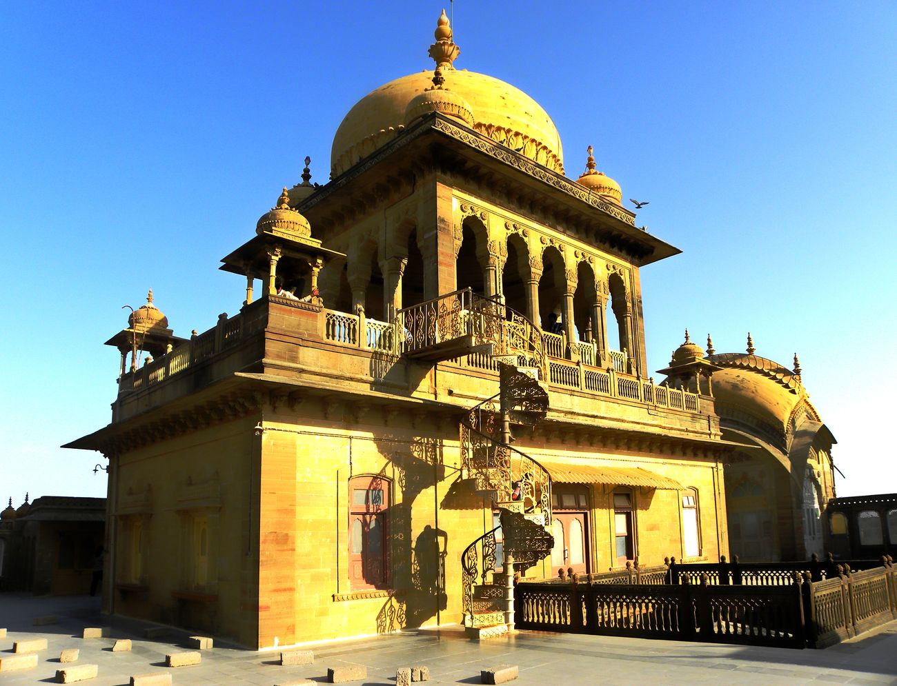 The main central dome of the Vijaya Vilas Palace glows in the sunlight - one of the most popular tourist attractions in all of Gujarat 