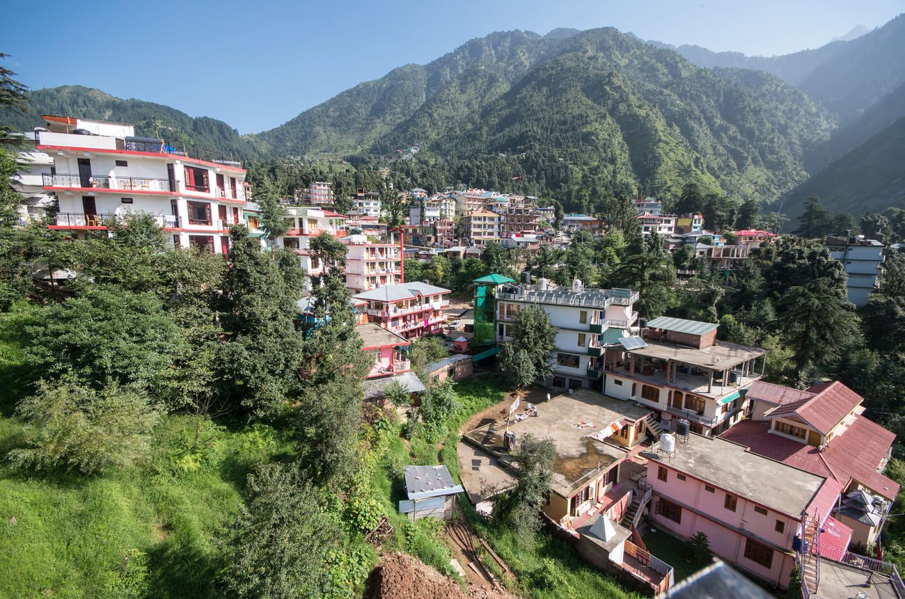The quaint village of Bhagsu built into the mountainside near McLeod Ganj in Dharamsala © Fat Jackey