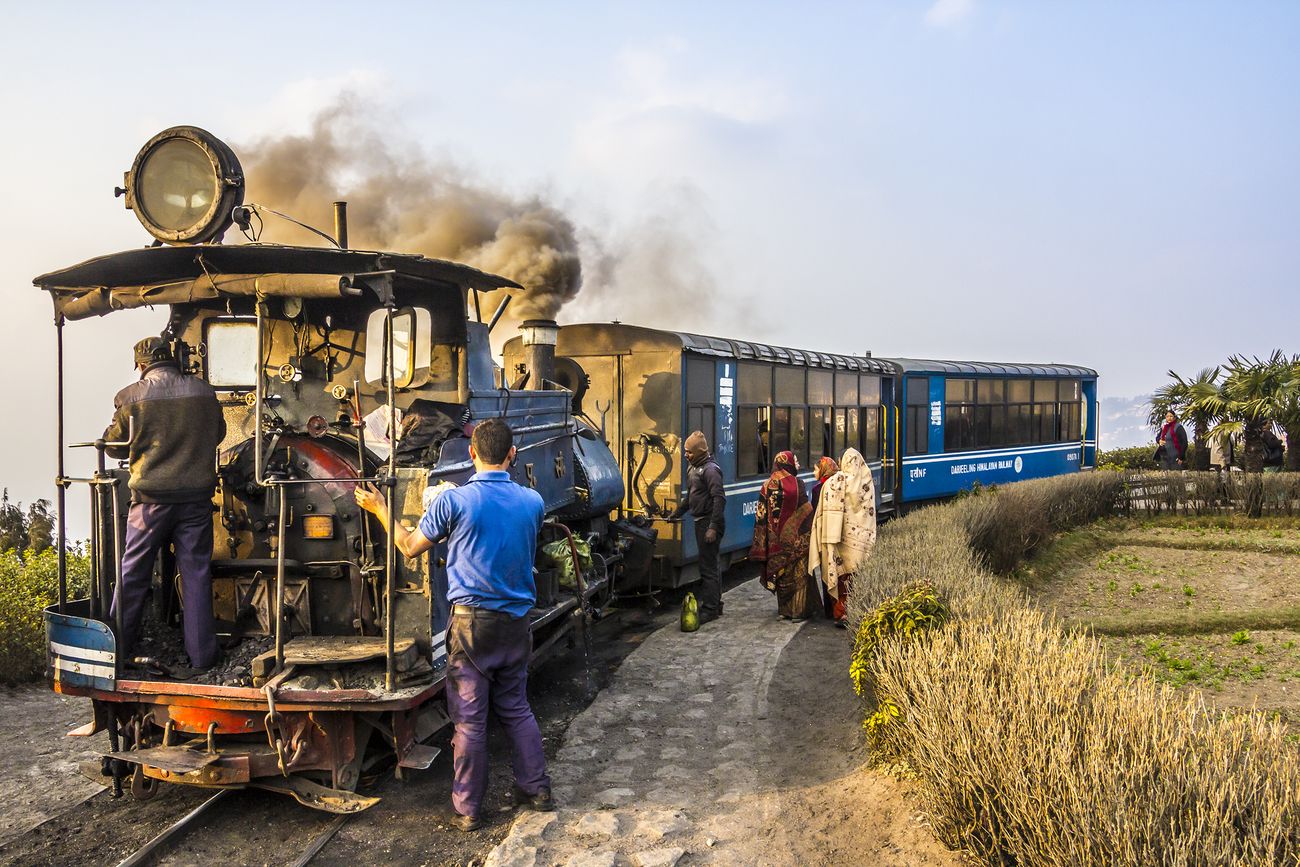 the short toy train with two bogeys and an engine