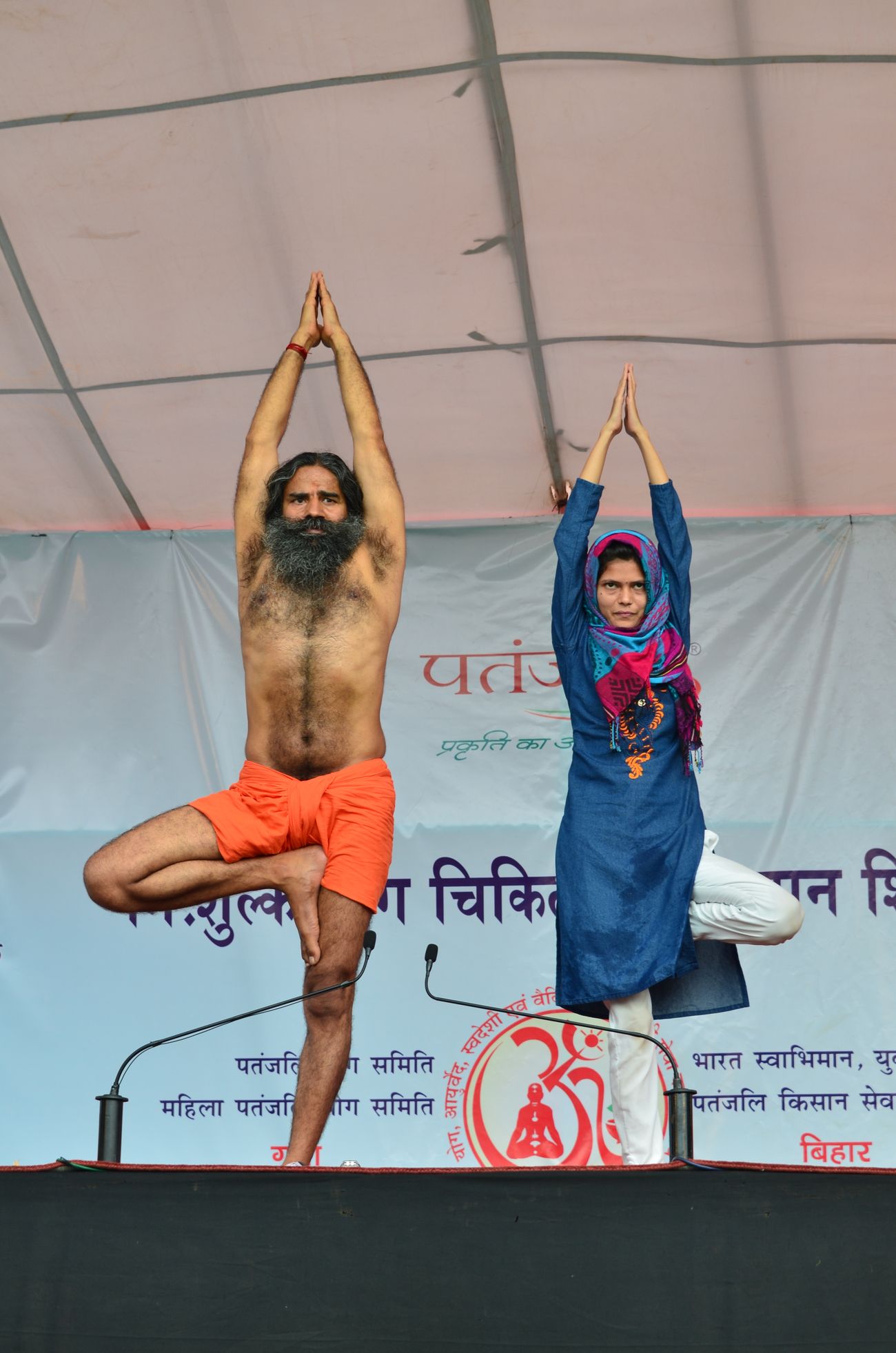 The slow-paced Hatha Yoga involves holding the posture for a few breaths. Renowned yoga guru, Baba Ramdev performs a yogasana on the stage on the final day of the three-day yoga camp at Gaya in Bihar.