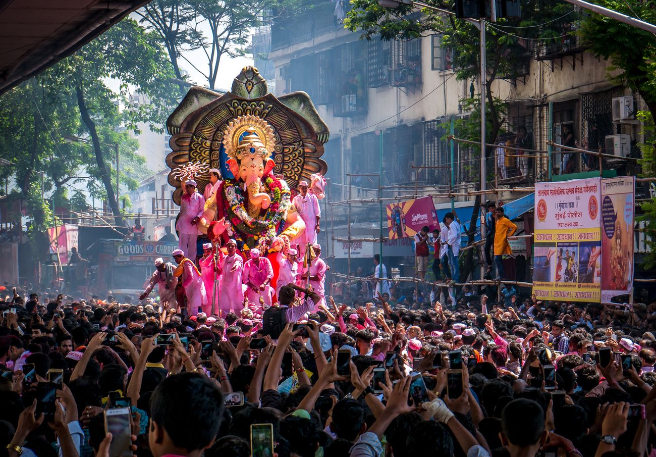 On the last day of the ten-day-long Ganesh Chaturthi festival, thousands of devotees join the procession bidding farewell to Lord Ganesha