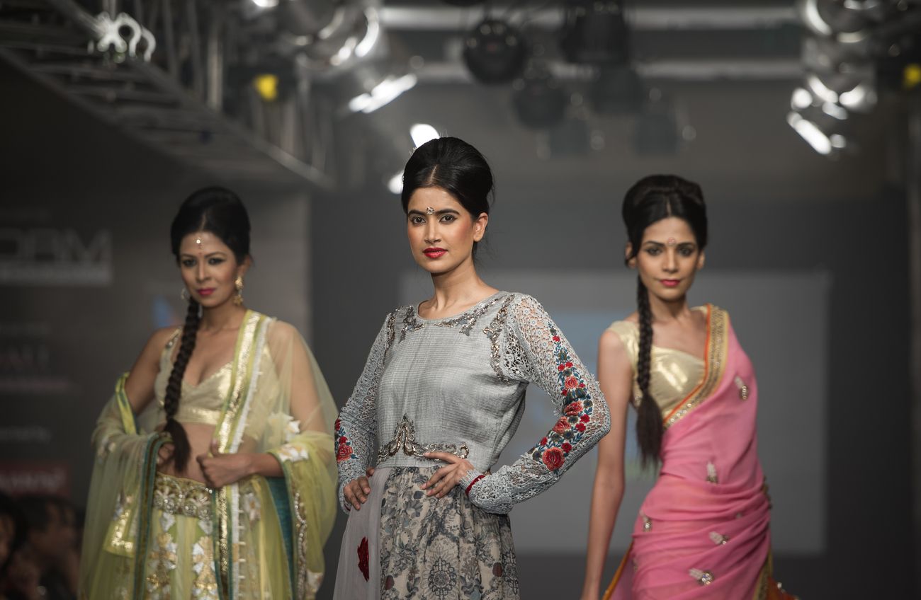 Three models showing off Anuradhaa Bisani’s designer-ware during Chennai’s International Fashion Week.