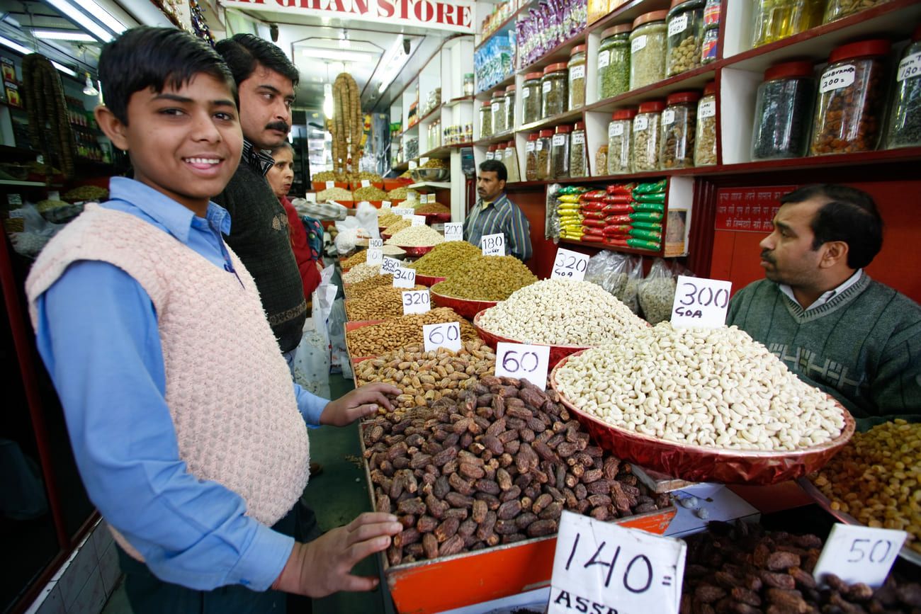Vibrant dried fruit market in Old Delhi, India. Dried fruit and nuts form part of the essentials in Indian cooking 