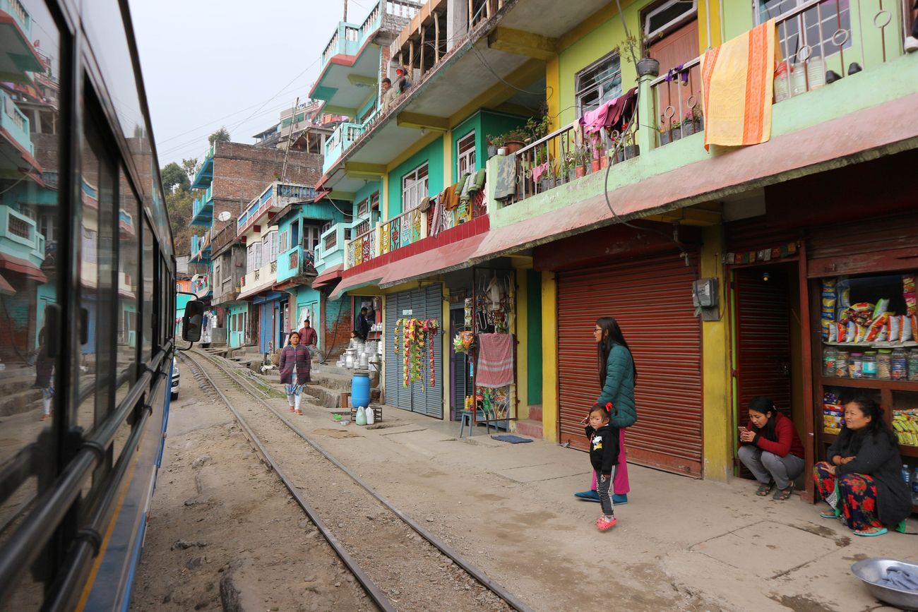 The view from the window of the Darjeeling Toy Train Everyday life seems to overflow on to the railway tracks You can look into people’s living rooms, check the jar labels in the stores, and have your mouth water at the sight of a delicious serving of dumplings