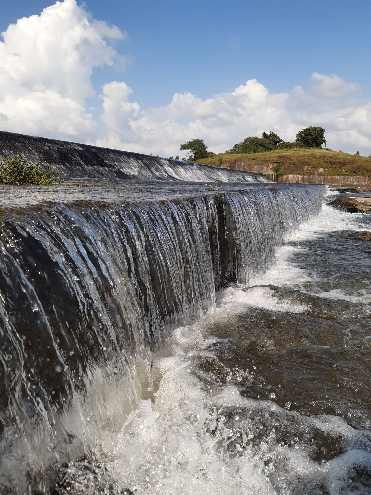 Water cascading down the Ozarkhed Dam on the Onanda River near Dindori