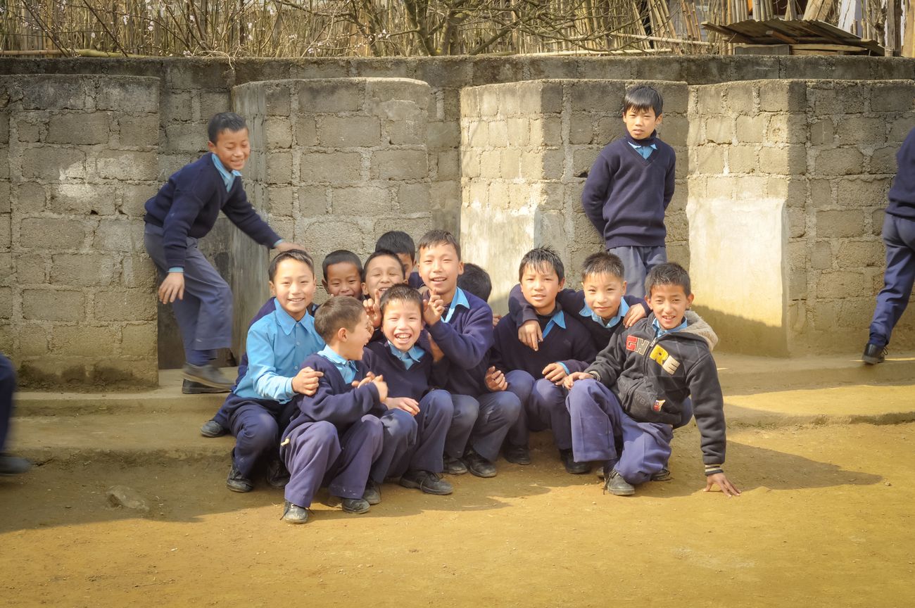 Schoolboys ready for a new day of learning are all set to pose for the camera. in Ziro, Arunachal Pradesh