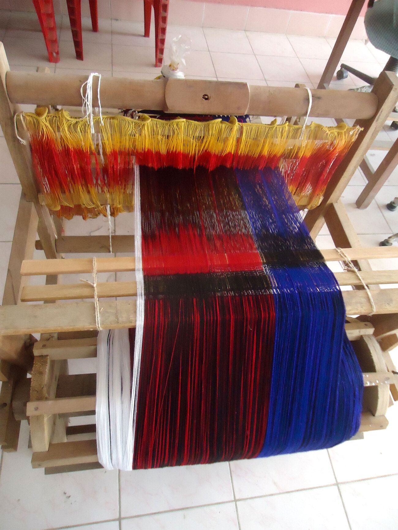 This is a traditional dress weaving technique of the Apatani tribe in Ziro. They believe in a disciplined life which is evident from their intricate zigzag and angular fabric weaving pattern