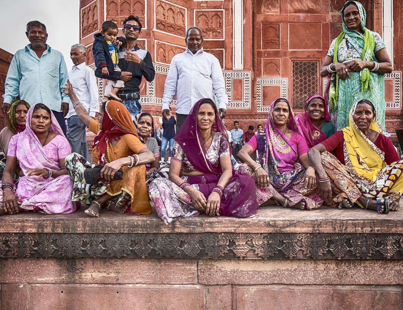 visitors photographed in taj mahal