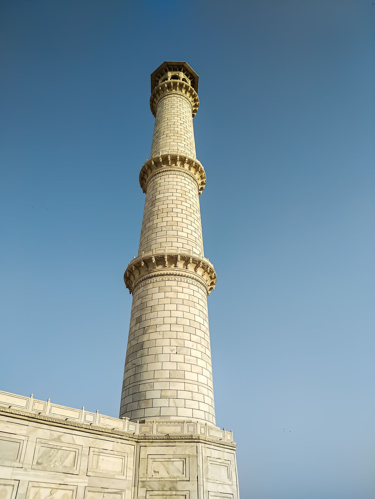 one of the four minarets taj mahal