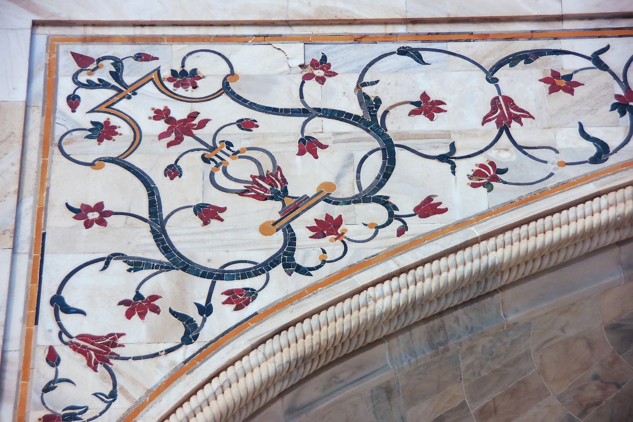 quran and persian poetry flowers inmarble in taj mahal