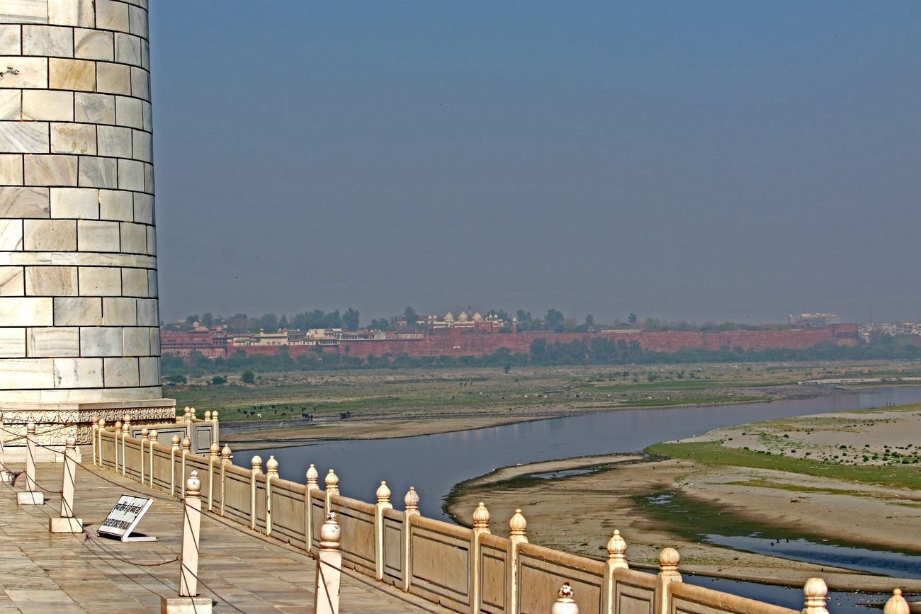 view of red fort and yamuna river from taj mahal