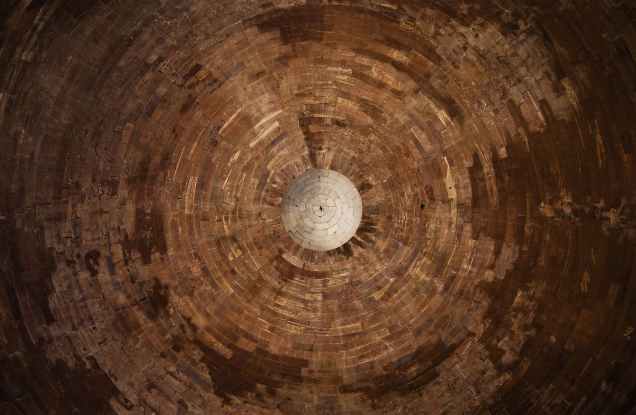 Detail of the carved ceiling in Alai Darwaza