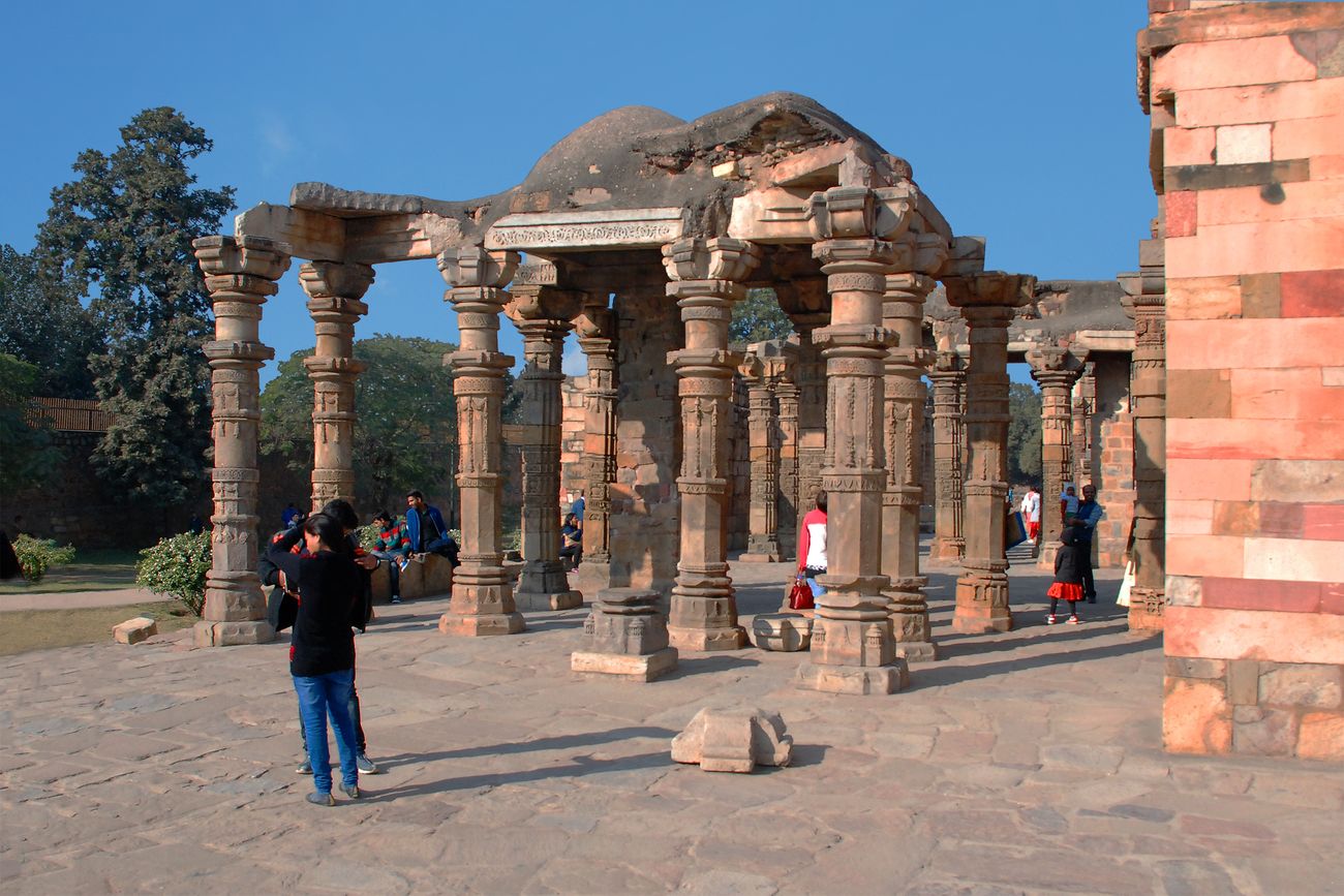 the colonnade in ruins of the historical complex qutub minar48