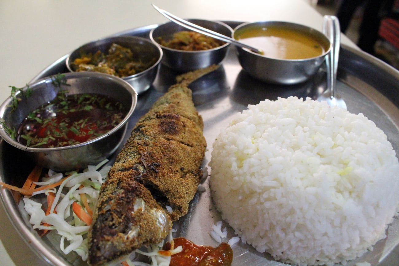 A platter containing Goan fish curry