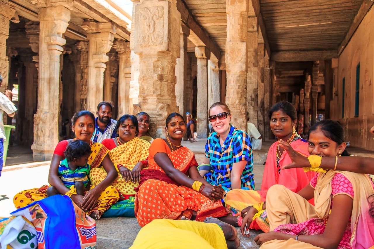 mingling of tourists with indians in temple