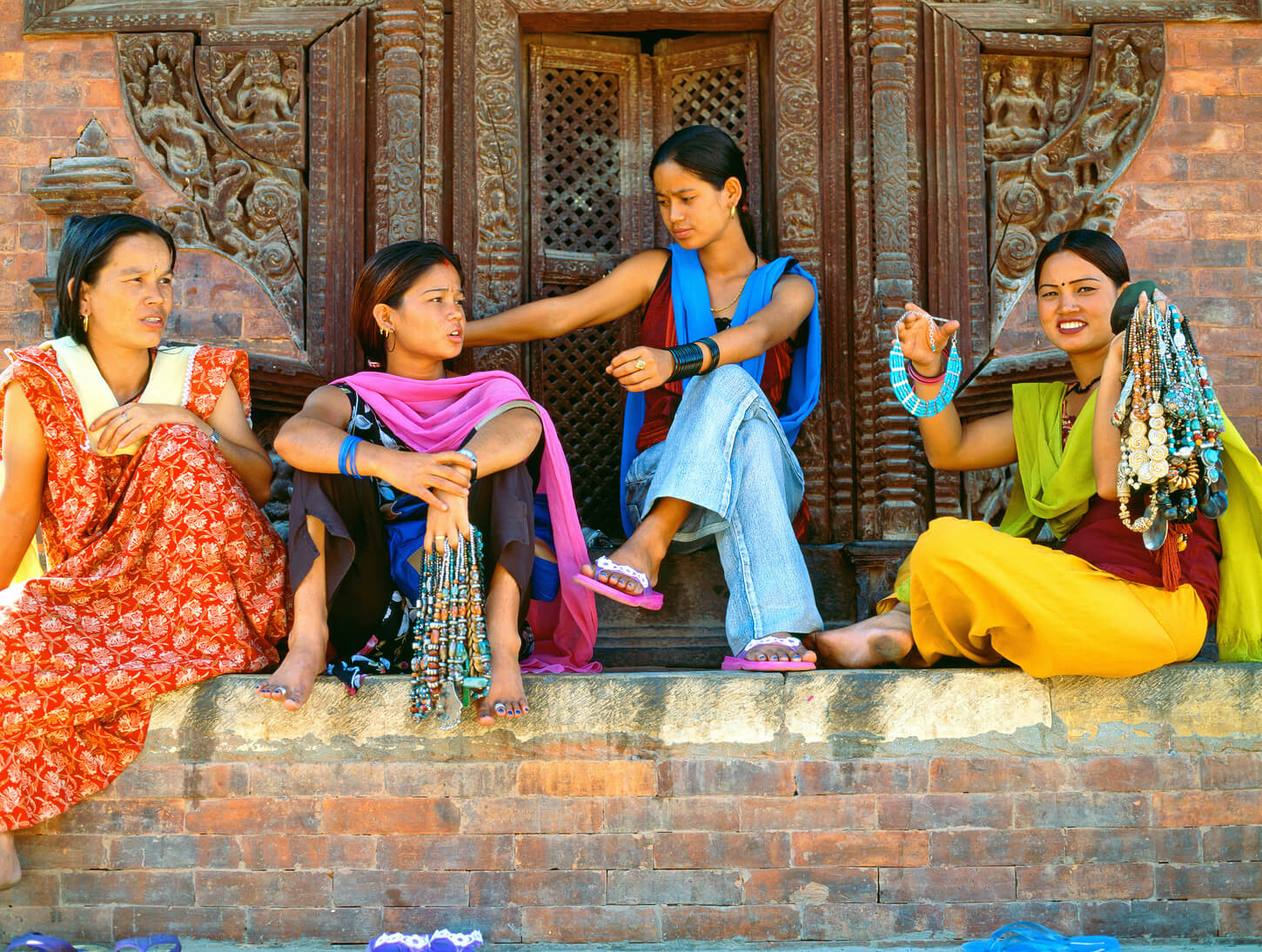 women selling trinkets at durbar square kathmandu nepal