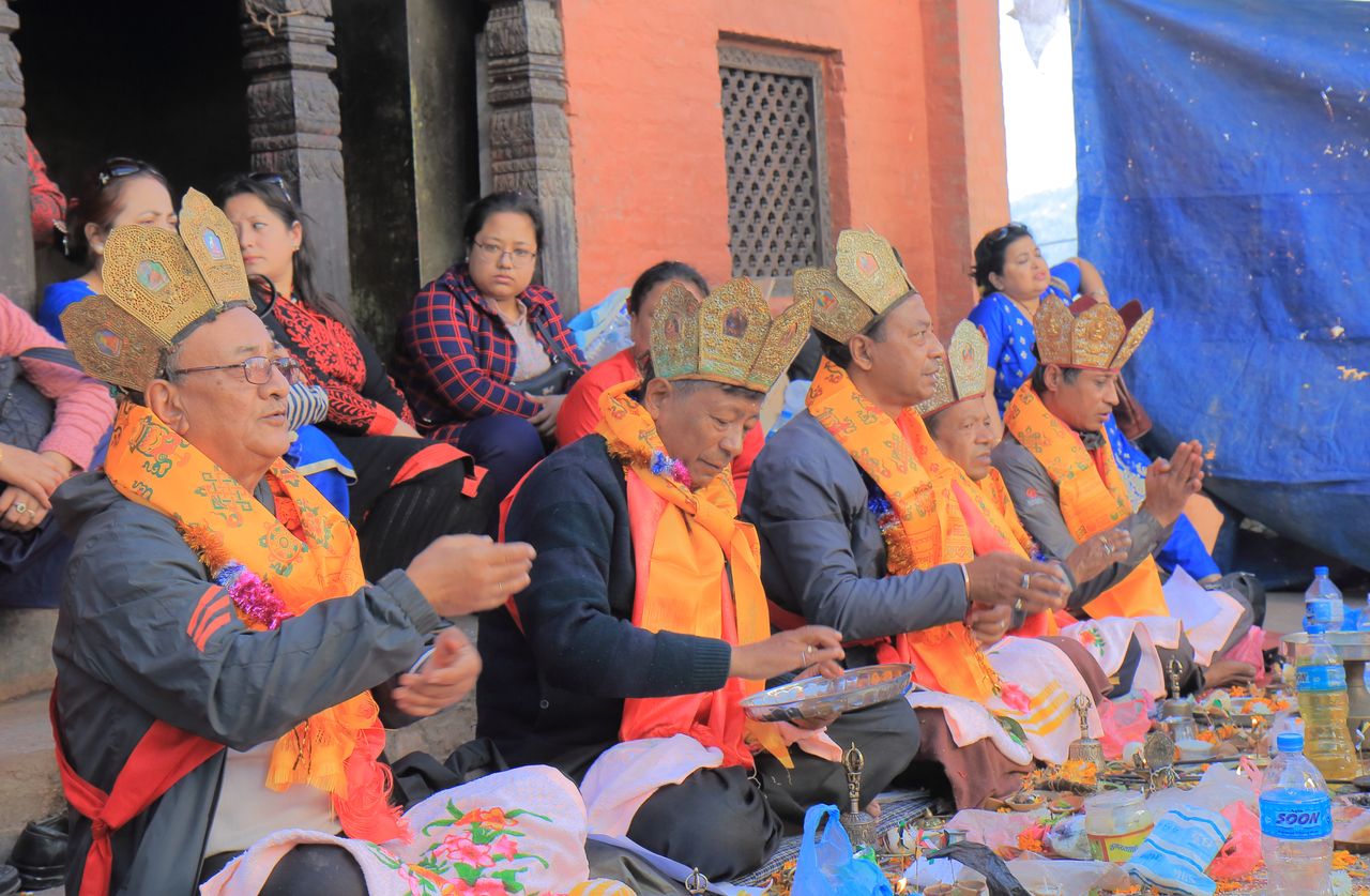 saints pray at religious ceremony at Swayambhunath Stupa temple Kathmandu